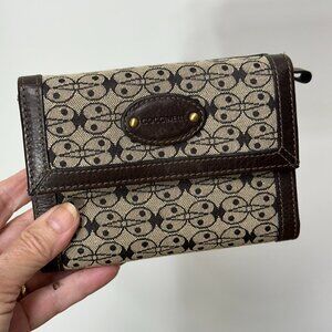 Woman's Coccinelle wallet with ladybug fabric and leather trim